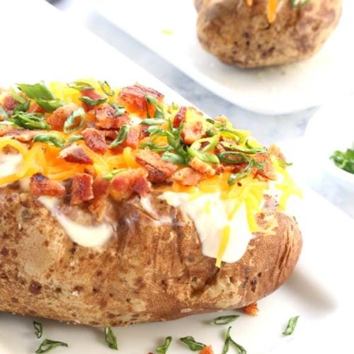 Fluffy Baked Potato with classic toppings is Today's Delight.